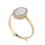 Load image into Gallery viewer, 9ct Gold Oval Opal CZ Halo Ring
