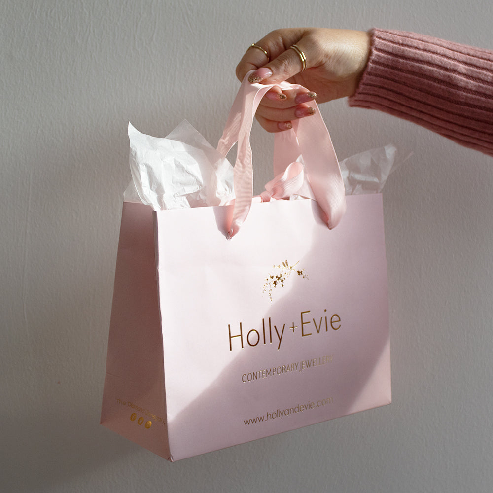 Holly + Evie packaging light pink bag